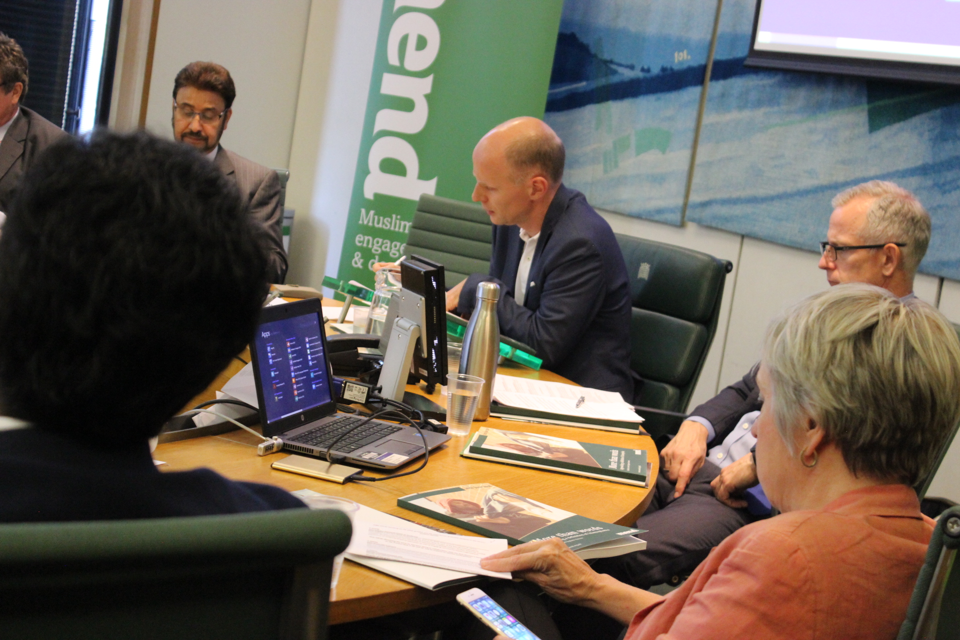 Parliamentarians celebrate launch of report exploring and defining Islamophobia.